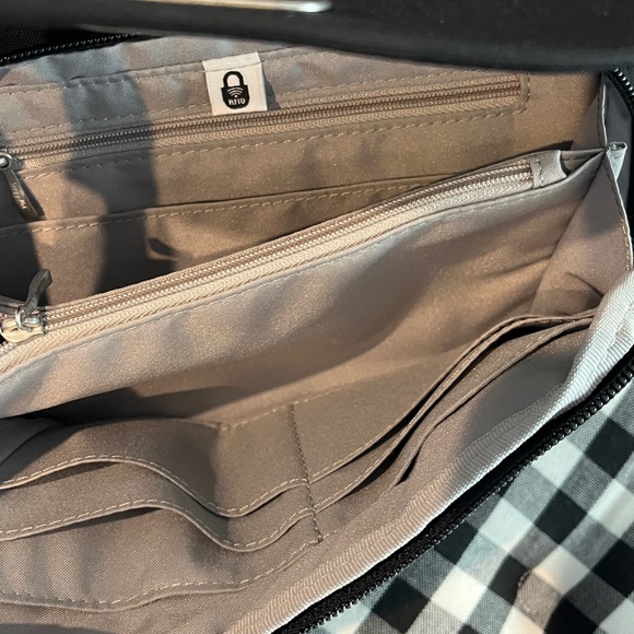 Baggallini Coastal Flip Lock Camera Crossbody Bag in black nylon. RFID - Picture 4 of 7